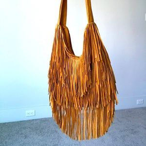 Fringed leather bag